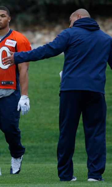 With knee on mend, Devontae Booker takes field for Broncos